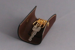 �L�[�P�[�X�k�@��